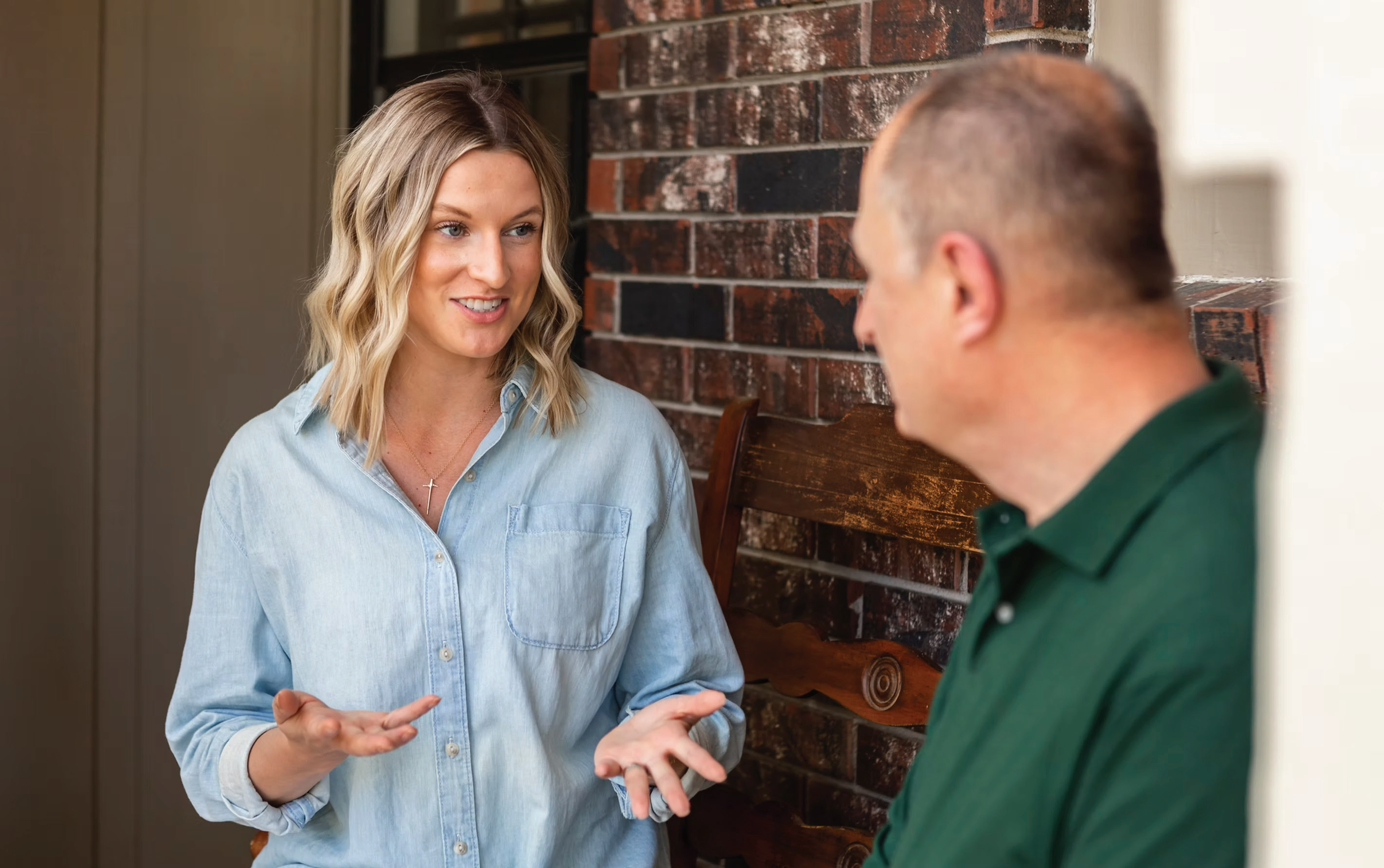Laura Williams talking with a constituent